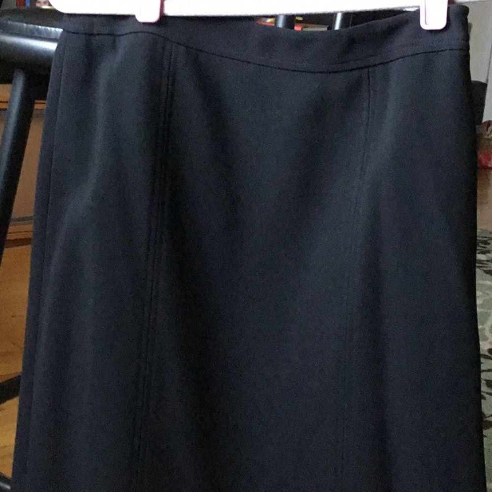 Black Ann Taylor skirt with pleating in the back